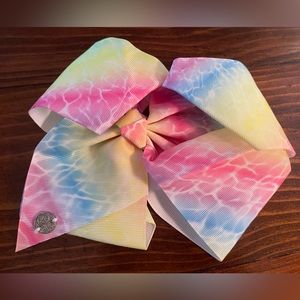 Jojo Siwa signature collectionBlue, Pink and Yellow Tye Dye Bow hair clip.